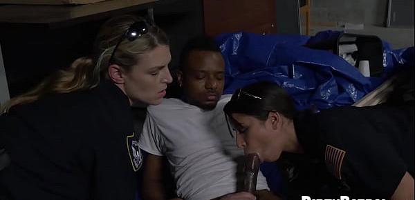  Busty officers take on a black monster cock in storage room